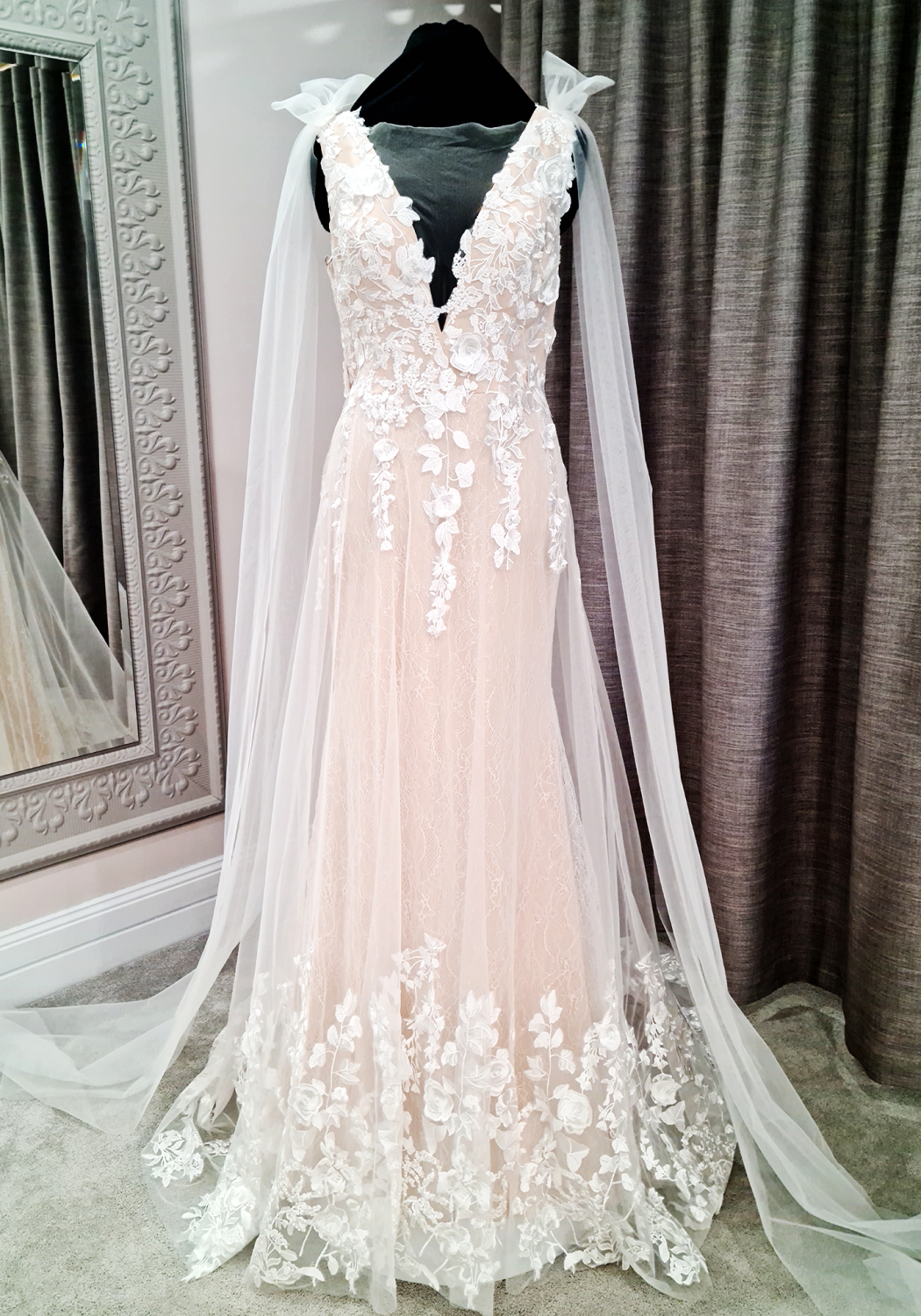 Mermaid style wedding dress, deep V neckline, beaded lace and tulle, champagne lining, with bridal wings